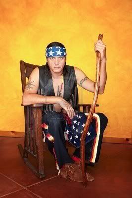 7934731-kneeling-native-american-man-in-rocking-chair.jpg